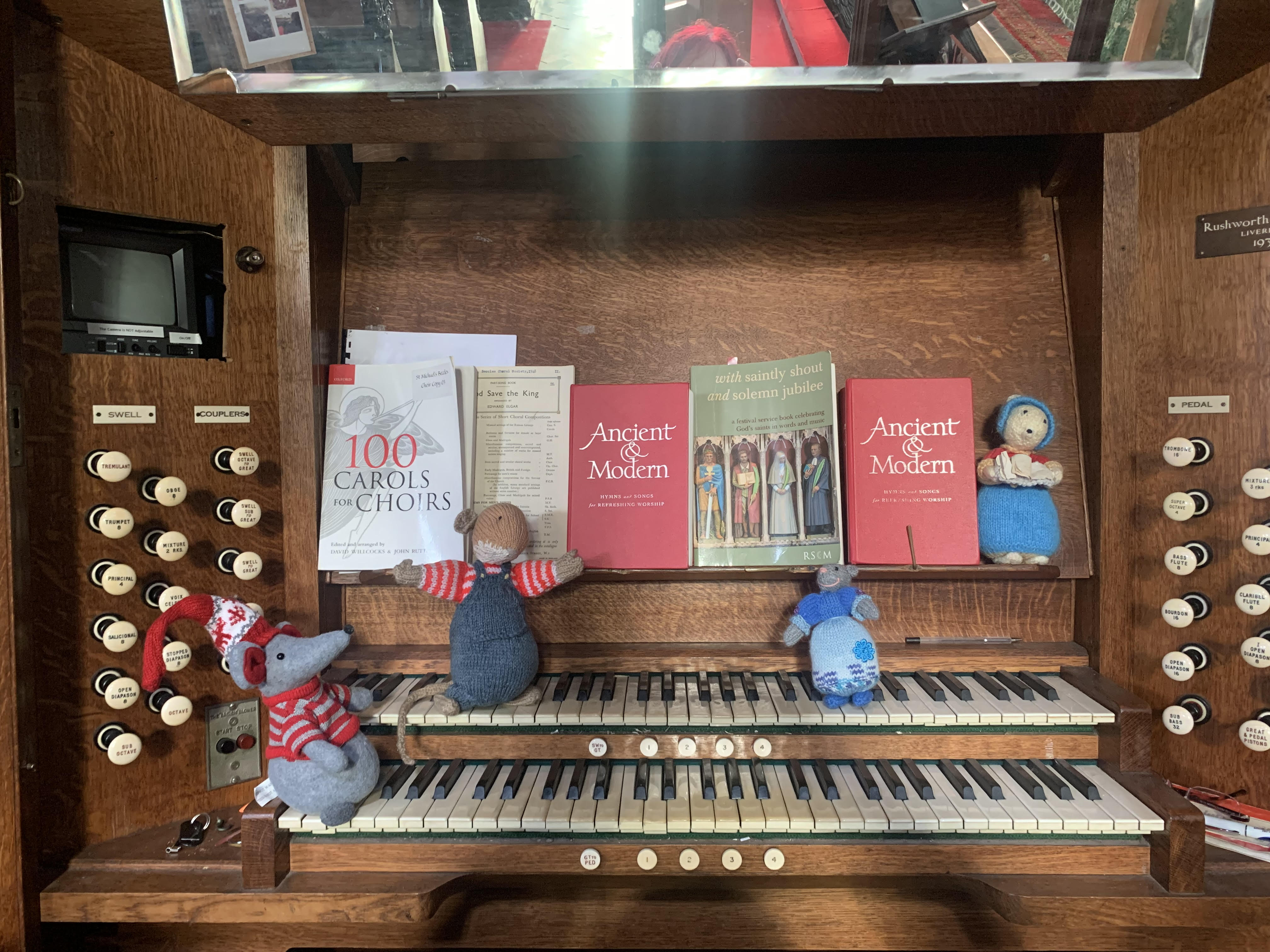 Dad playing carols on the organ