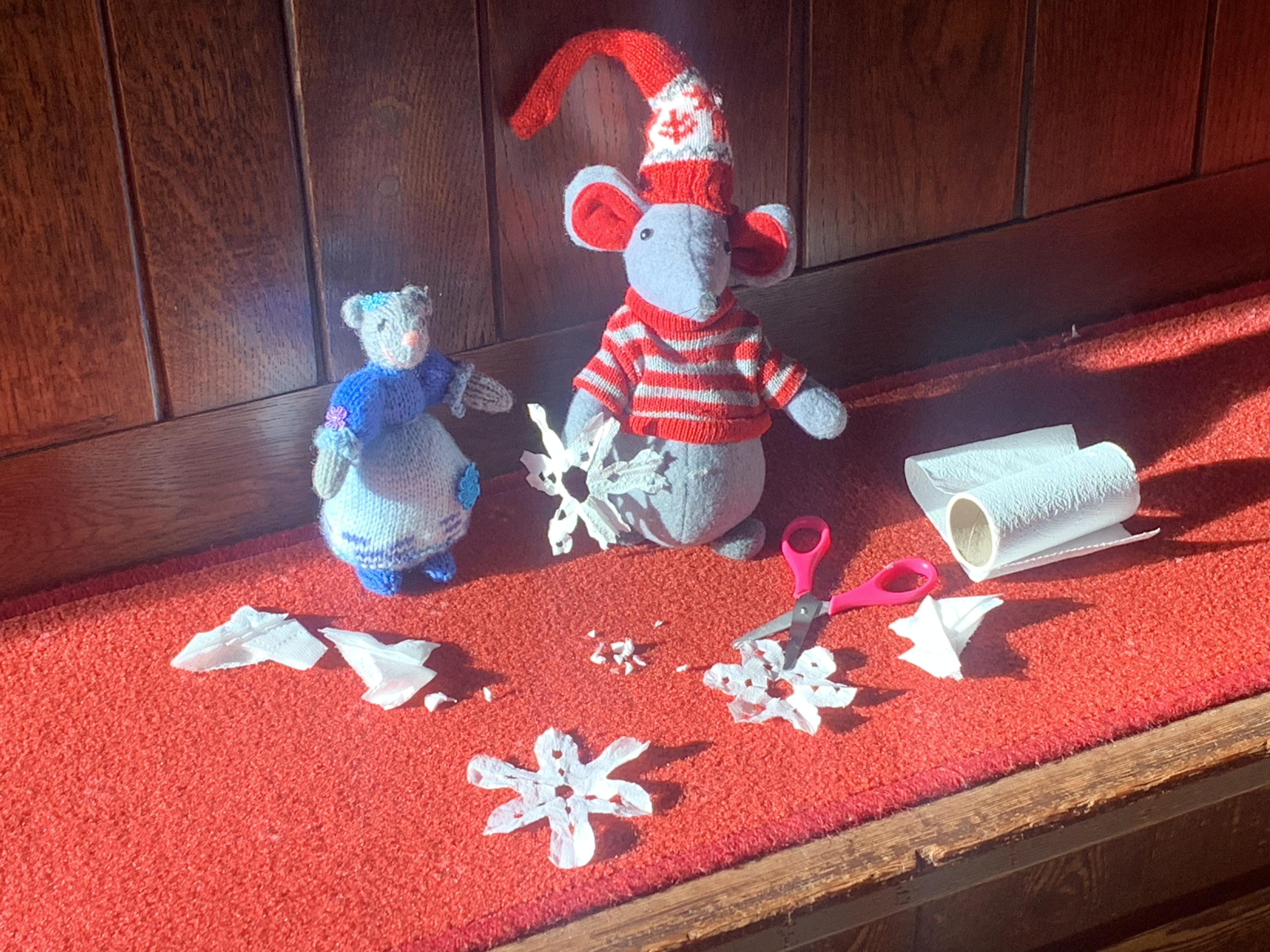 Chris and Hattie make snowflakes